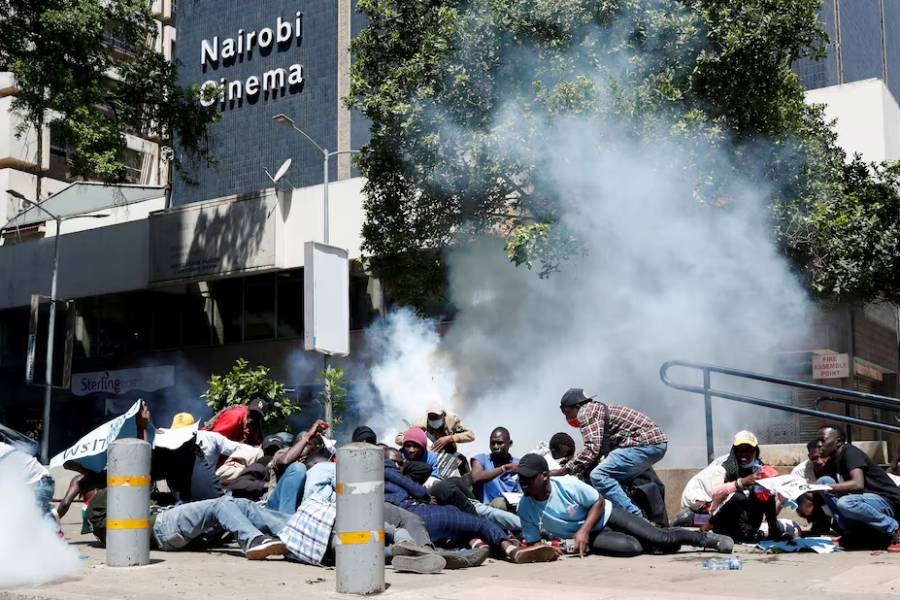 Protesters demonstrating against what they say is a wave of unexplained abductions of government critics, react after riot police lobbed teargas canisters to disperse them along the Aga Khan walk in downtown Nairobi, Kenya December 30, 2024.