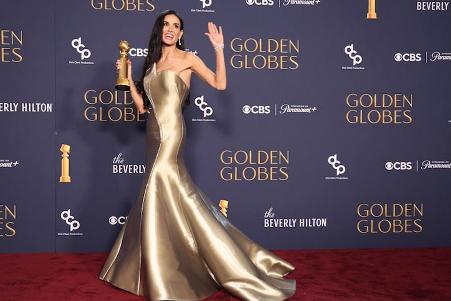 Demi Moore poses with the award for Best Performance by an Actress in a Motion Picture - Musical or Comedy, for The Substance, at the 82nd Golden Globe Awards in Beverly Hills, California, US, January 5, 2025.