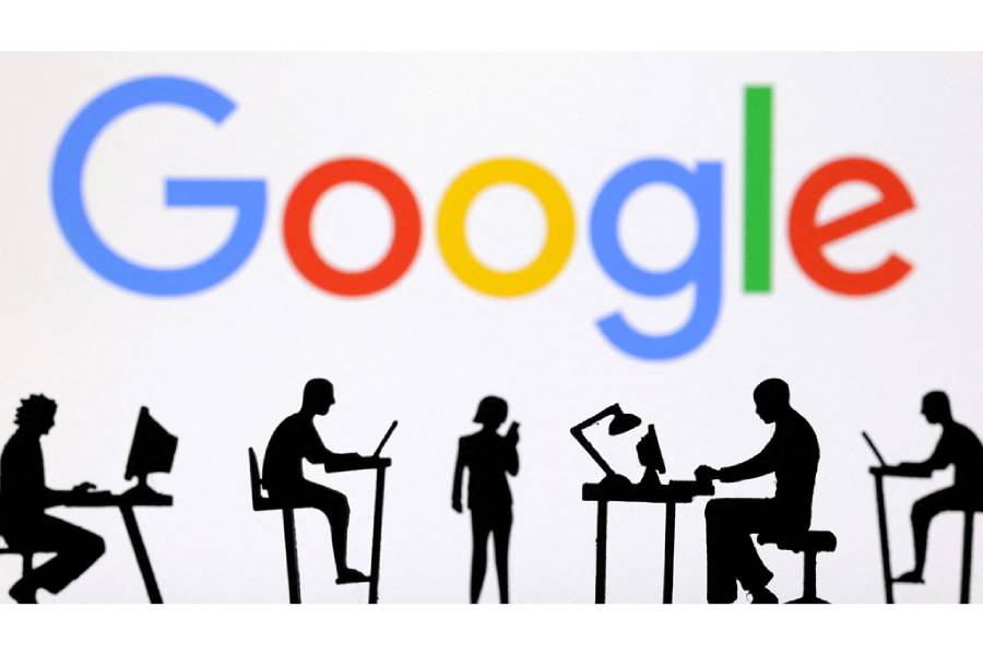 Figurines with computers and smartphones are seen in front of Google logo in this illustration taken, Feb 19, 2024.