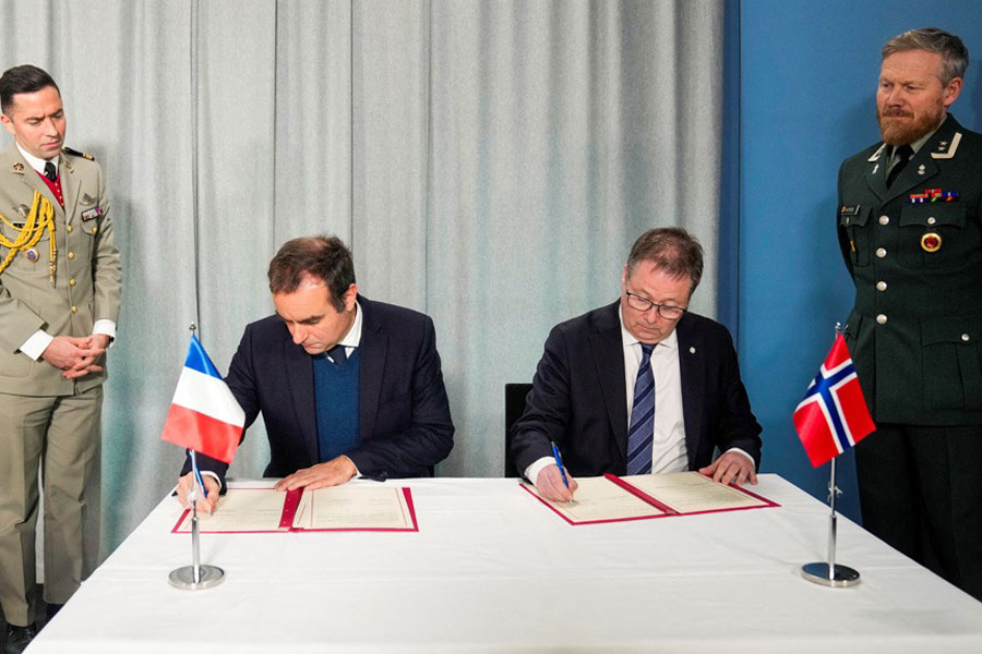 French Defence Minister Sebastien Lecornu sits next to Norwegian Defence Minister Bjoern Arild Gram as he visits him for political meetings about the Norwegian defense industry at Akershus Fortress, in Oslo, Norway, Jan 16, 2025.