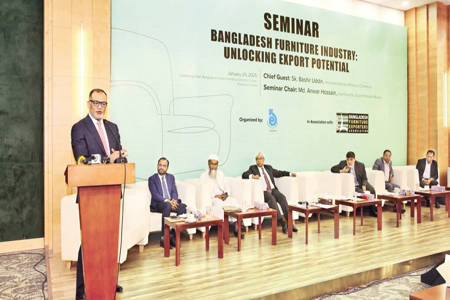 Commerce Adviser Sk. Bashir Uddin speaks at a seminar on 'Bangladesh Furniture Industry: Unlocking Export Potential' at the Bangladesh-China Friendship Exhibition Centre in Purbachal on Monday