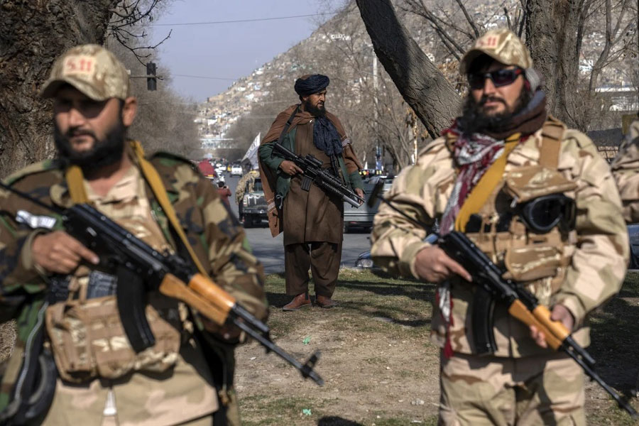 Taliban fighters stand guard in Kabul, Afghanistan, on Dec. 26, 2022.