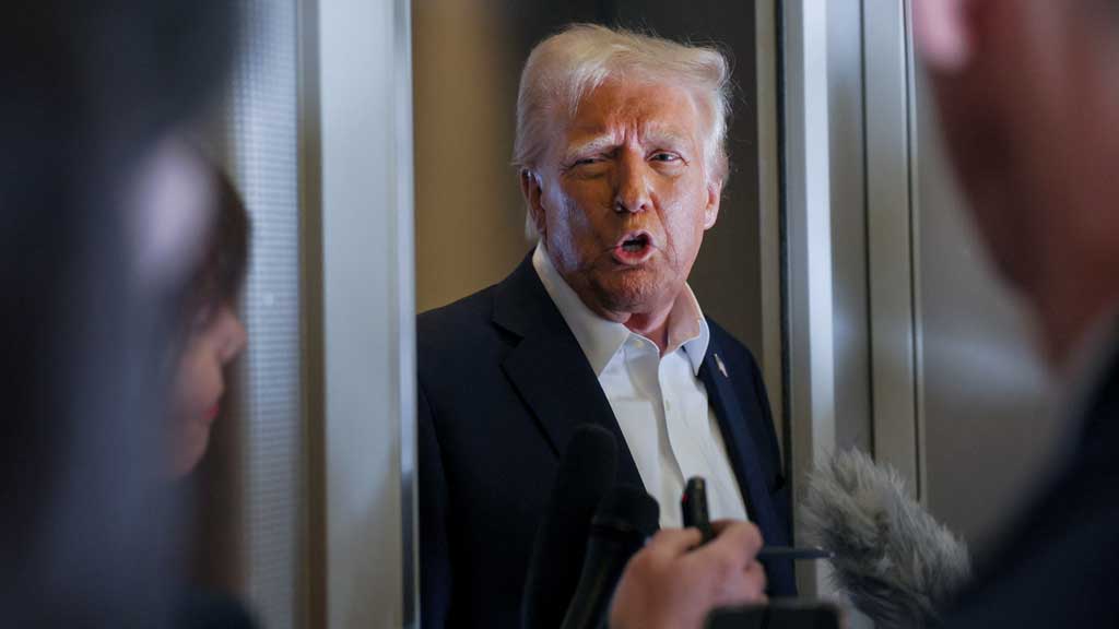 US President Donald Trump speaks with reporters as they ask questions aboard Air Force One during a flight from Las Vegas, Nevada, to Miami, Florida, US, Jan 25, 2025. REUTERS/Leah Millis