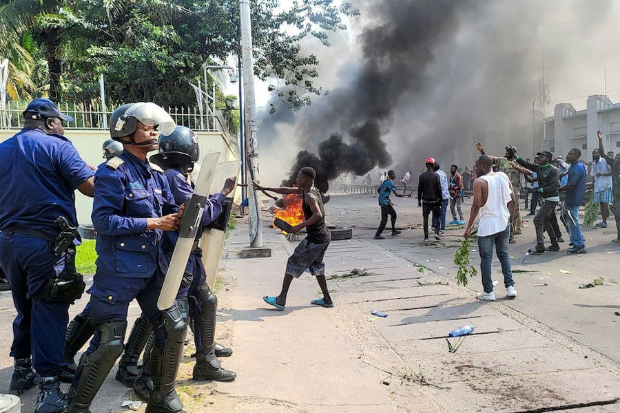 Protesters clash with riot police forces in front of the French Embassy in Kinshasa, Democratic Republic of Congo January 28, 2025.