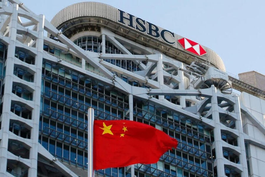 A Chinese national flag flies in front of HSBC headquarters in Hong Kong, China, July 28, 2020.