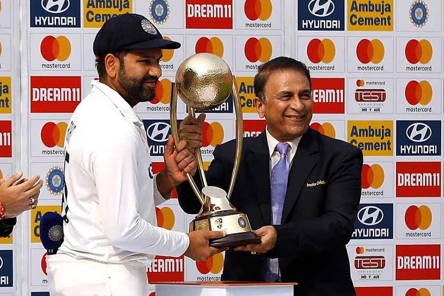 India’s Rohit Sharma receiving the Border Gavaskar trophy from Sunil Gavaskar after winning the test series against Australia at Narendra Modi Stadium in Ahmedabad of India on March 13 this year –Reuters file photo