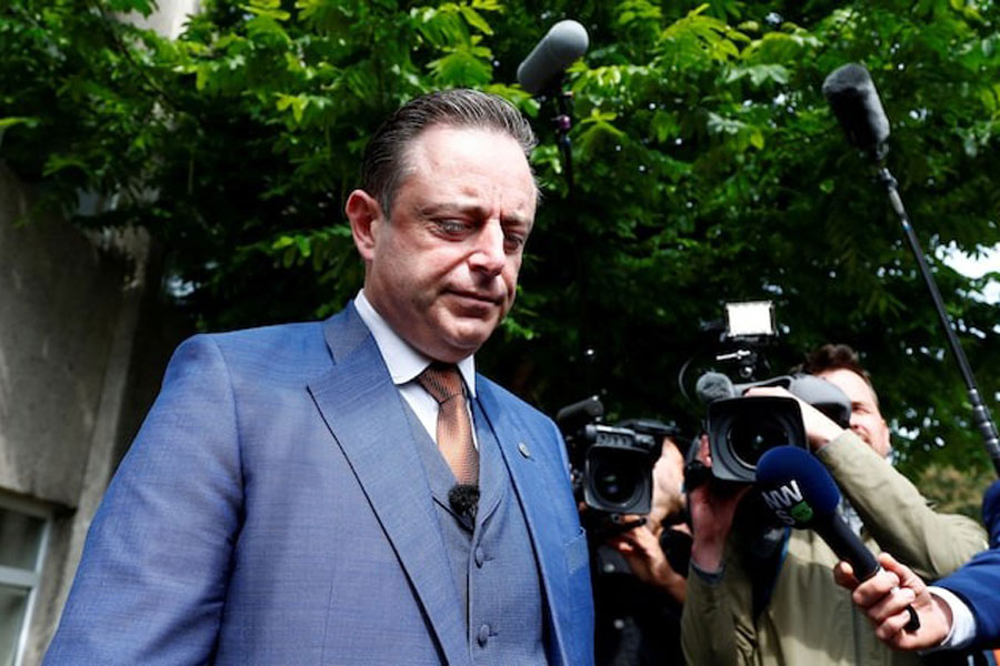 Bart De Wever, President of Flemish nationalist party N-VA, talks to the media after casting his vote for the Belgian general and regional elections and for the European Parliament Elections in Antwerp, Belgium May 26, 2019.