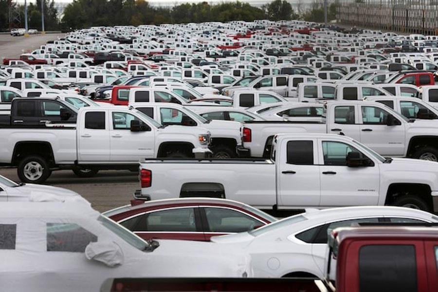 New trucks crowd a parking lot at the GM assembly plant in Oshawa, Ontario, Canada September 24, 2019.