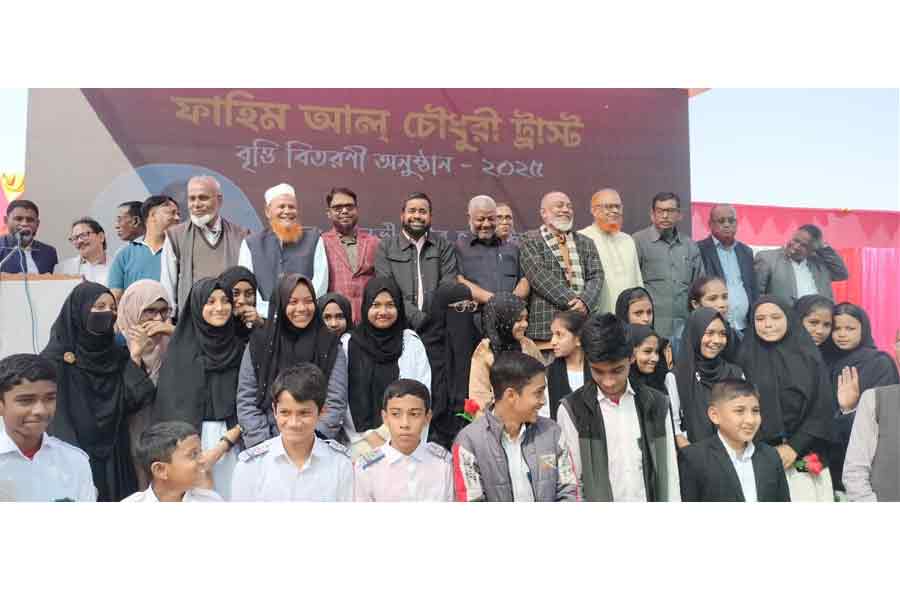 Fahim Al Chowdhury Trust scholarship-winning students posing for a photograph along with distinguished guests at a ceremony in Sylhet on Saturday –Press release photo
