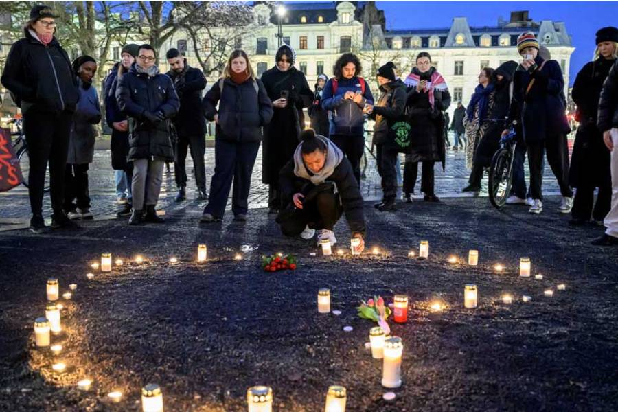 Candles are placed at Gustav Adolfs torg to honor the victims of the school shooting in Orebro, in Malmo, Sweden Feb 07, 2025.