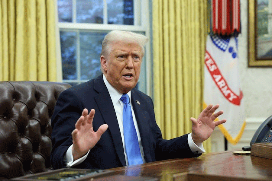 US President Donald Trump speaks in the Oval Office of the White House in Washington, D.C., US, February 11, 2025.