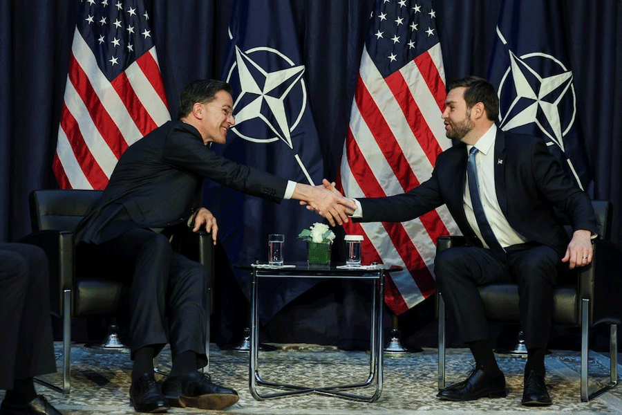 US Vice President JD Vance shakes hands as he participates in a bilateral meeting with NATO Secretary General Mark Rutte at the Commerzbank in Munich, Germany, February 14, 2025.