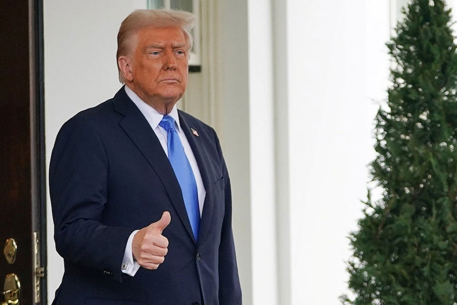 US President Donald Trump gestures, after his meeting with Jordan's King Abdullah, at the White House in Washington, DC, US, February 11, 2025.