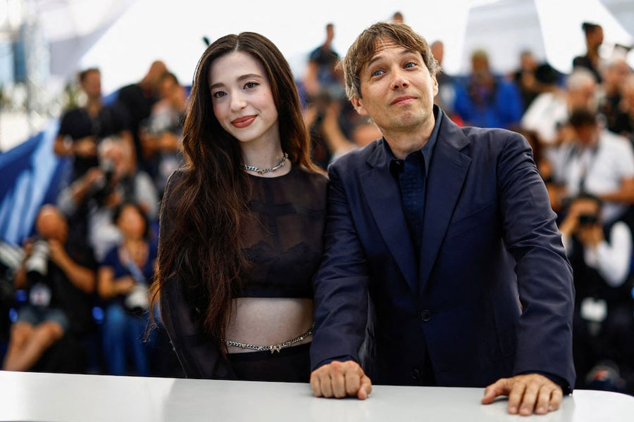 Director Sean Baker and cast member Mikey Madison pose during a photocall for the film “Anora” in competition at the 77th Cannes Film Festival in Cannes, France, May 22, 2024.