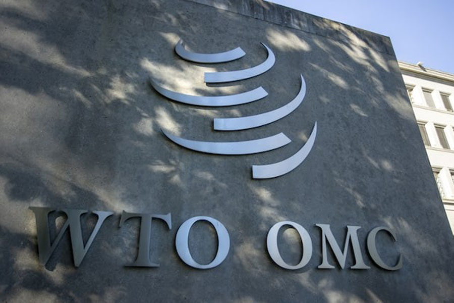 A logo is seen at the World Trade Organization (WTO) headquarters before a news conference in Geneva, Switzerland, October 5, 2022.