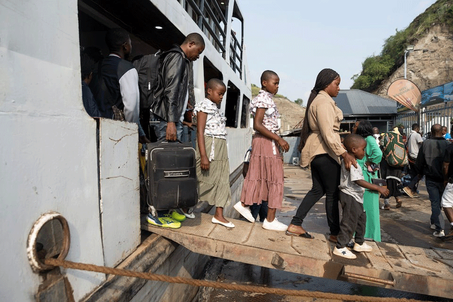 Passengers arriving from Bukavu disembark from the Emmanuel boat, on its first trip between Bukavu and Goma since the city was taken by M23 rebels, in Goma, North Kivu province, Democratic Republic of Congo February 18, 2025.
