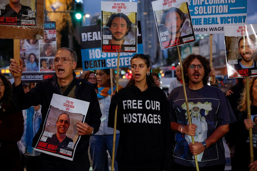 Dana Shem Tov, sister of Omer Shem Tov, 21, an Israeli hostage kidnapped on the deadly October 7 attack on Israel by Palestinian Islamist group Hamas from Gaza, shouts slogans next to other relatives, friends and supporters during a rally calling for the hostages' release, amid the ongoing conflict in Gaza between Israel and Hamas, outside the Israeli Ministry of Defense, in Tel Aviv, Israel on March 7, 2024 — Reuters photo