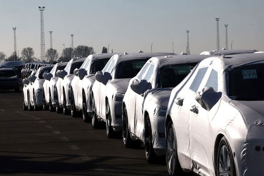 New cars are seen parked in the port of Zeebrugge, Belgium, October 24, 2024.