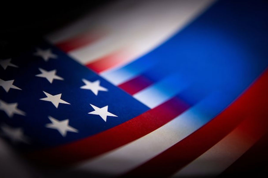 US and Russian flags are seen printed on paper in this illustration taken January 27, 2022.