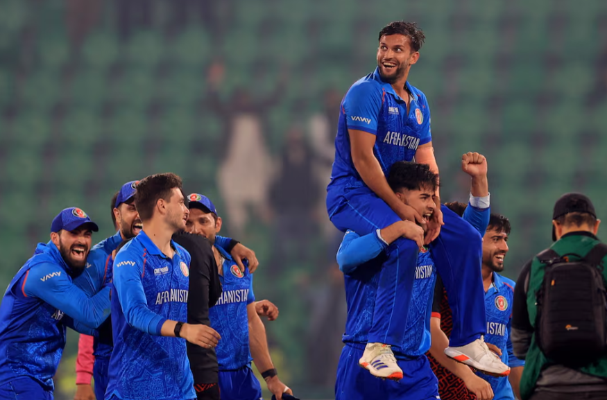 ICC Men's Champions Trophy - Group B - England v Afghanistan - Gaddafi Stadium, Lahore, Pakistan - February 26, 2025 Afghanistan players celebrate after winning the match REUTERS/Akhtar Soomro