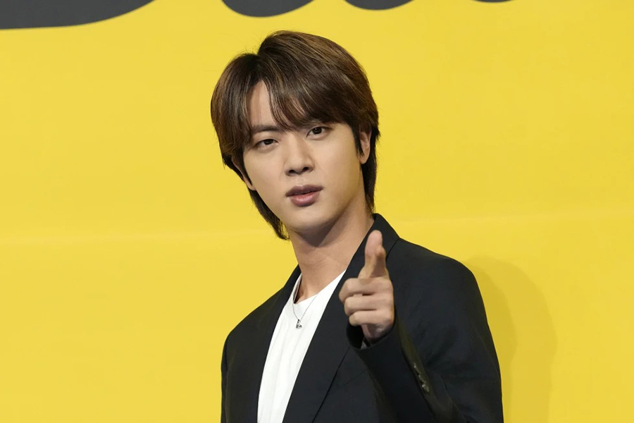 Jin, a member of South Korean K-pop band BTS, poses for photographers ahead of a press conference to introduce their new single “Butter” in Seoul, South Korea, on May 21, 2021 — AP/File