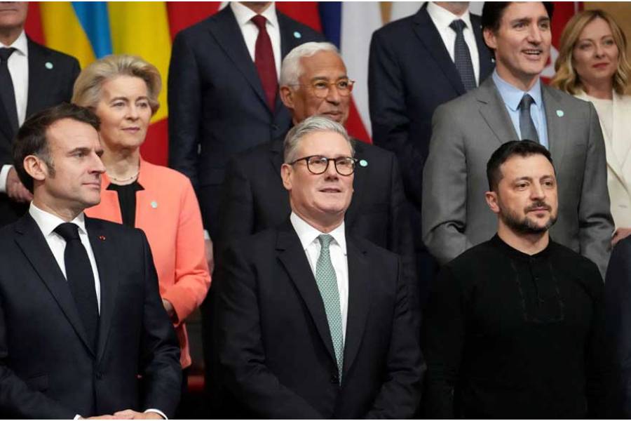French President Emmanuel Macron, Britain’s Prime Minister Keir Starmer and Ukraine’s President Volodymyr Zelensky pose during a group photo at a summit on Ukraine at Lancaster House in London, Britain, Mar 2, 2025.