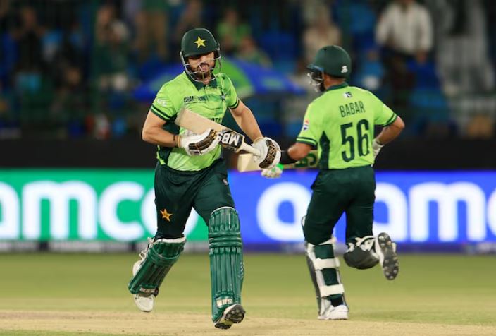 ICC Men's Champions Trophy - Group A - Pakistan v New Zealand - National Stadium, Karachi, Pakistan - February 19, 2025 Pakistan's Salman Ali Agha and Babar Azam in action running between the wickets REUTERS/Akhtar Soomro/ File Photo