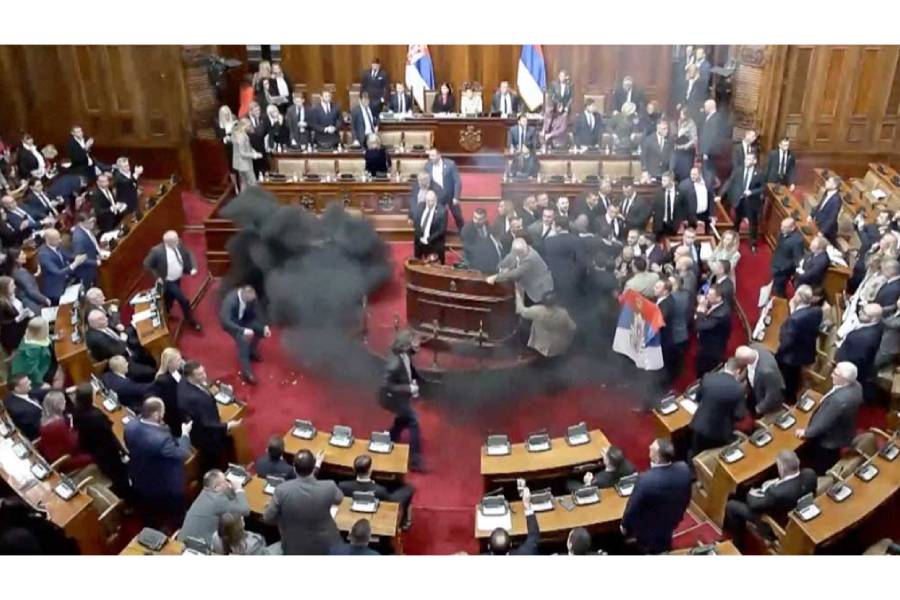 Serbian opposition lawmakers let off smoke grenades inside Serbian parliament, in Belgrade, Serbia March 4, 2025, in this screengrab taken from a video.