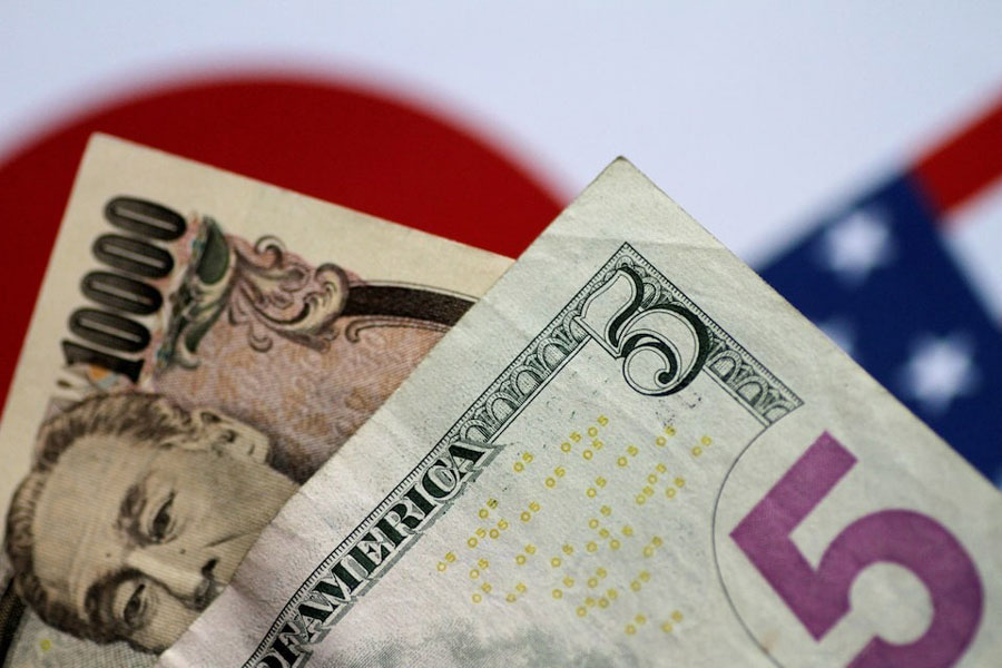 US Dollar and Japan Yen notes are seen in this picture illustration June 2, 2017.