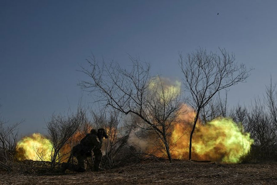 Members of the National Police Special Purpose Battalion of Zaporizhzhia region fire a D-30 howitzer towards Russian troops on a front line, amid Russia's attack on Ukraine, in Zaporizhzhia region, Ukraine March 7, 2025.