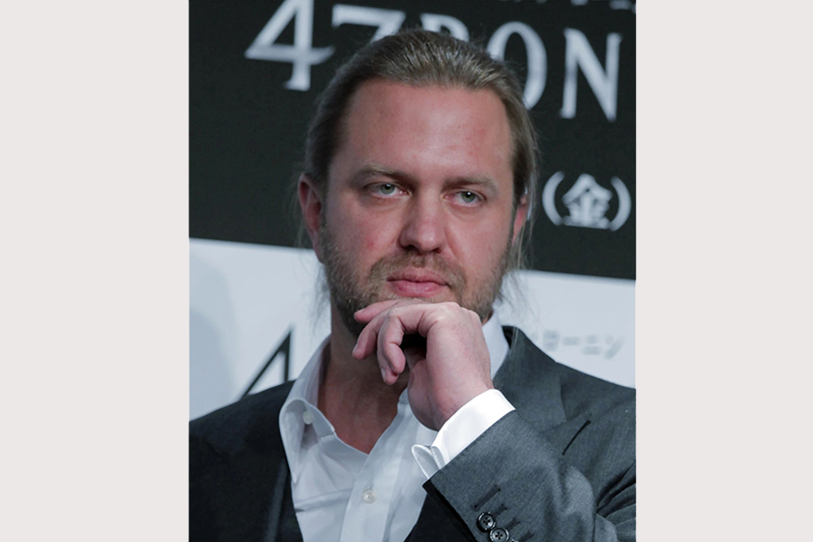 Director Carl Rinsch poses for photographers during a news conference to promote his 3-D film "47 RONIN" in Tokyo, Japan on November 18, 2013 — AP/File