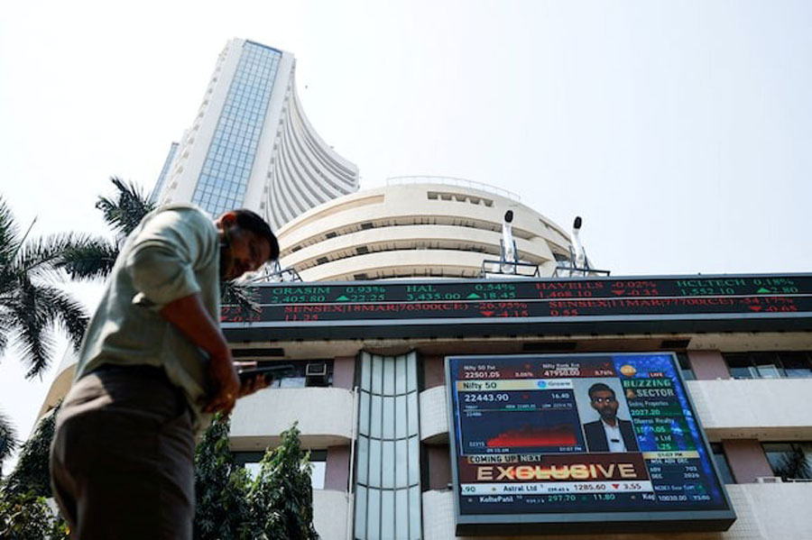 A man walks past the Bombay Stock Exchange (BSE) building in Mumbai, India, March 11, 2025.