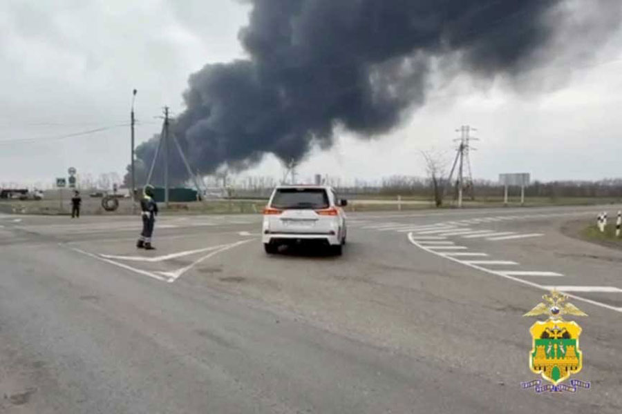 Black smoke rises from the site of fire following an explosion at an oil depot, which was recently hit by a drone what local authorities called a Ukrainian a military strike, in the settlement of Kavkazskaya in the Krasnodar region, Russia, in this still image from video released March 21, 2025.
