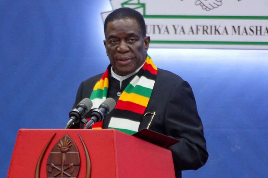 Zimbabwe President Emmerson Mnangagwa addresses delegates at a joint summit from the Southern African Development Community (SADC) and the East African Community (EAC) to discuss the conflict in eastern Congo, in Dar es Salaam, Tanzania February 8, 2025.