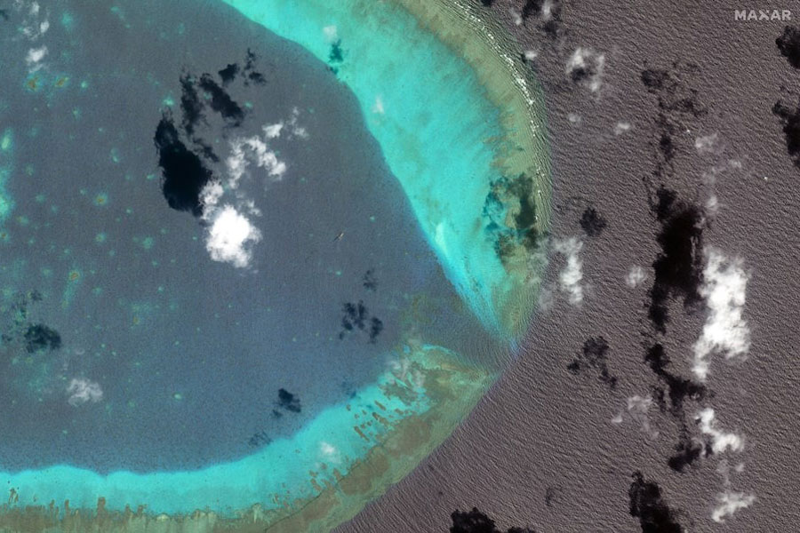 Chinese H-6 bombers fly at the eastern edge of the disputed Scarborough Shoal in the South China Sea, March 24, 2025.