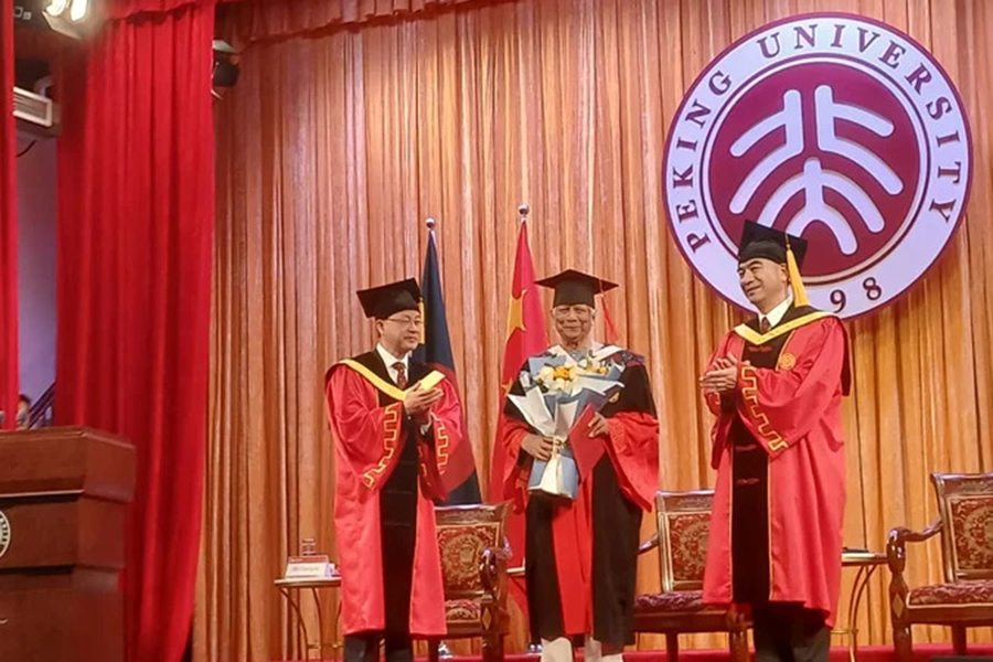 Chief Adviser Professor Muhammad Yunus is honoured with an honorary doctorate at Peking University Ceremony