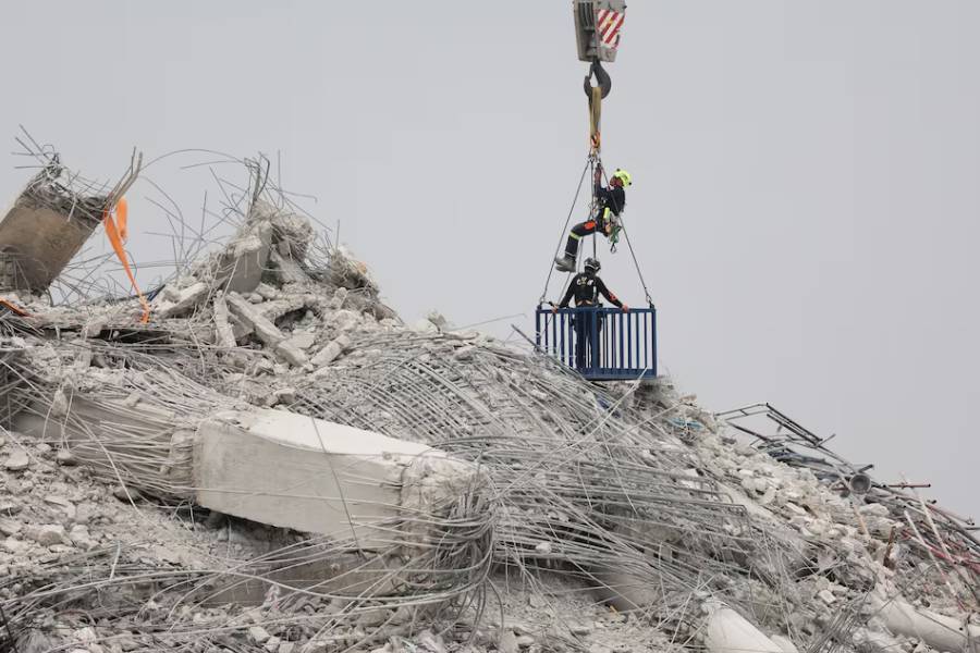 Rescue personnel work at the site of a building that collapsed, following a strong earthquake, in Bangkok, Thailand, March 31, 2025.