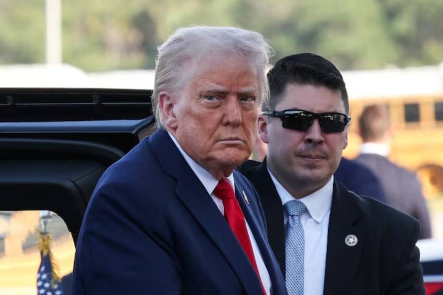 U.S. President Donald Trump looks on before he departs for Washington, from West Palm Beach, Florida, U.S., March 30, 2025.
