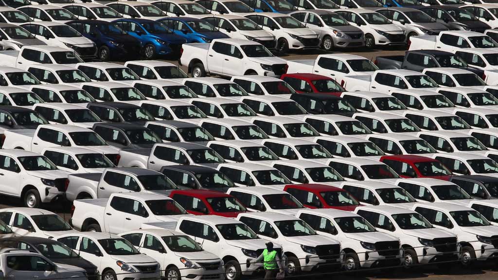 A general view shows vehicles parked at the Nissan CIVAC plant, in Jiutepec, Morelos state, Mexico March 28, 2025. REUTERS/Margarita Perez Retana