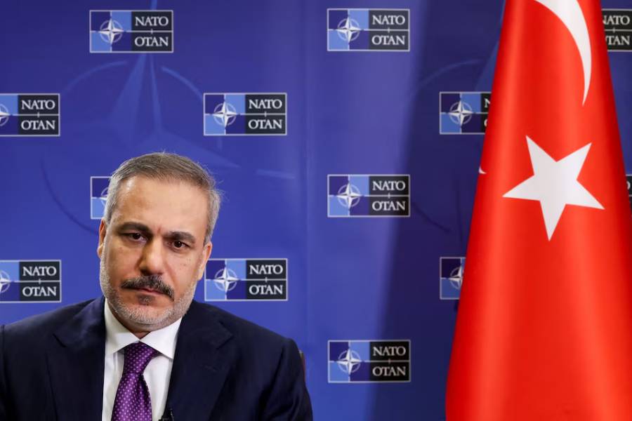 Turkish Foreign Minister Hakan Fidan attends an interview with Reuters, in Brussels, Belgium April 4, 2025.