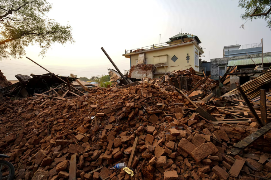 Rubble lies near a damaged building following a strong earthquake in Pyawbwe township, Mandalay, Myanmar, April 4, 2025.