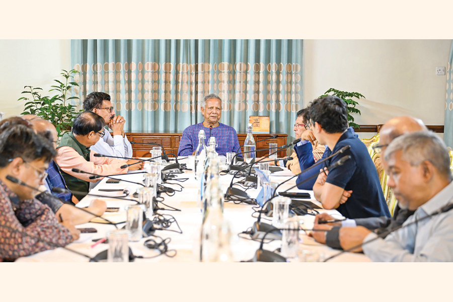 Chief Adviser Prof Dr Muhammad Yunus sits in an emergency meeting with high officials and experts at the state guest house Jamuna on Saturday in response to the latest US tariff hike on Bangladeshi exports. — Collected Photo