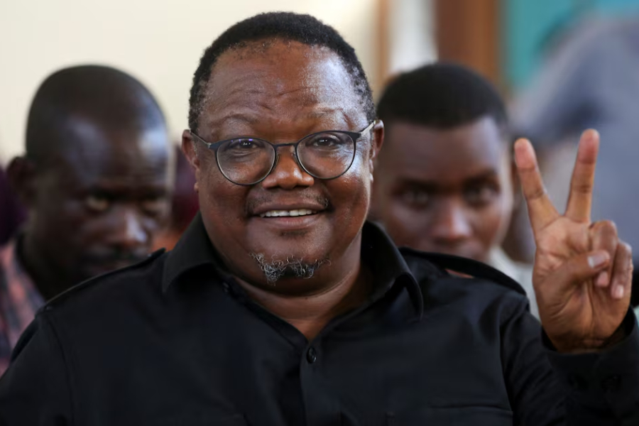 Tanzanian opposition leader and former presidential candidate of CHADEMA party Tundu Lissu flashes a two finger salute as he sits inside the Kisutu Resident Magistrate's Court in Dar es Salaam, Tanzania April 10, 2025.