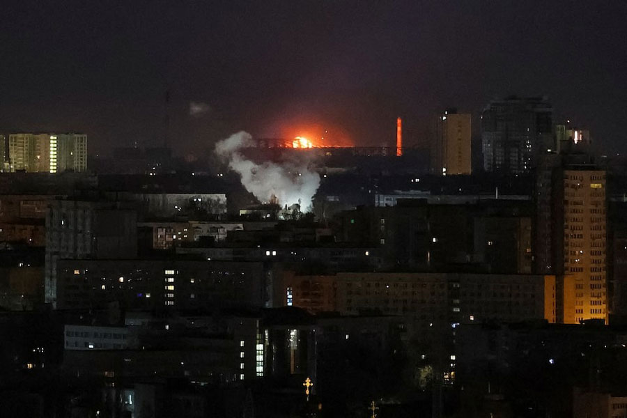 A drone explodes in the sky over the city during a Russian drone strike, amid Russia's attack on Ukraine, in Kyiv, Ukraine April 12, 2025.