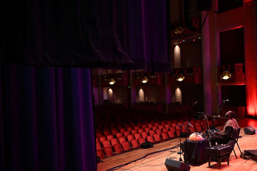Lights illuminate chairs at the Robert and Judi Newman Center for the Performing Arts before a performance in Denver, Colorado, US, April 11, 2025.