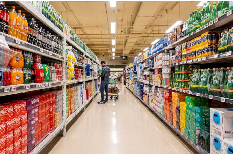 A person shops in the beverage aisle at a grocery store in Toronto, Ontario, Canada November 22, 2022.