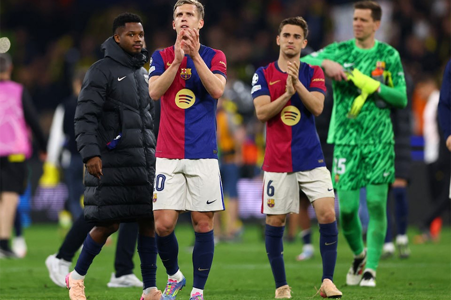 FC Barcelona's Dani Olmo and Pablo Gavira celebrate after the Second Leg match of Champions League Quarter Final against Borussia Dortmund at Signal Iduna Park, in Dortmund, Germany on April 15, 2025 — Reuters photo