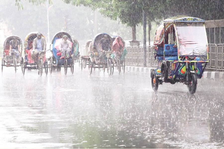 After days of unbearable heat, a rainfall of moderate to heavy magnitude swept over different parts of the capital Dhaka on Wednesday afternoon, bringing respite to city residents, and suffering also somewhere. — FE Photo