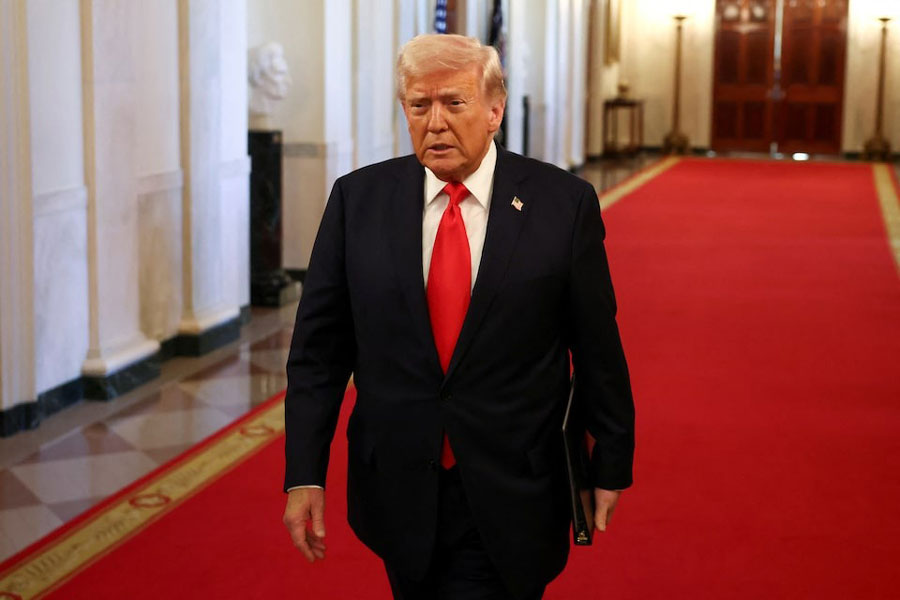 US President Donald Trump arrives for a presentation of the Commander-in-Chief trophy to the US Navy Midshipmen football team of the United States Naval Academy, at the White House in Washington, DC, US, April 15, 2025.