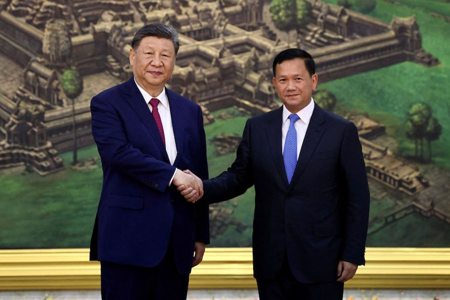 Chinese President Xi Jinping meets with Cambodia's Prime Minister Hun Manet at the Peace Palace in Phnom Penh, Cambodia, April 17, 2025.